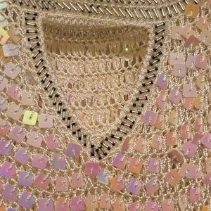 Linne / blus med paljetter - Väldig fin linne med vit och olika färg som visar sig olika färger med olika ljuset 