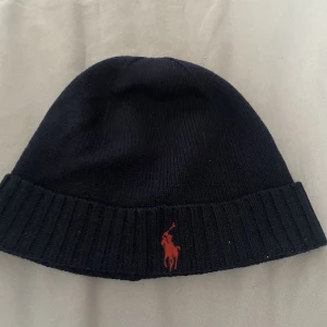 Ralph lauren mössa - Använd ralph lauren mössa