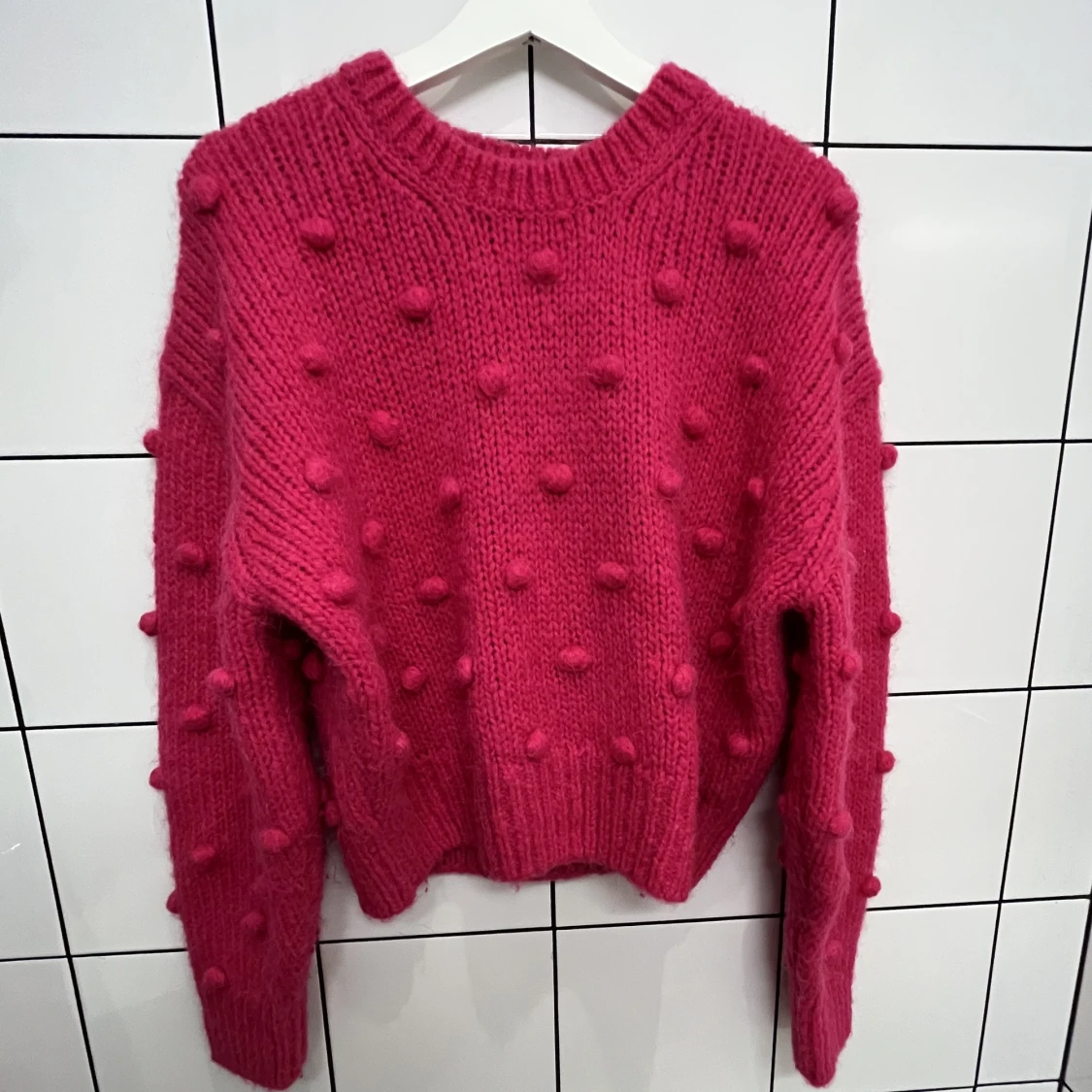 Rosa stickad tröja
