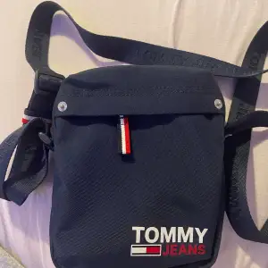 Tommy väska helt ny aldrig använd. 