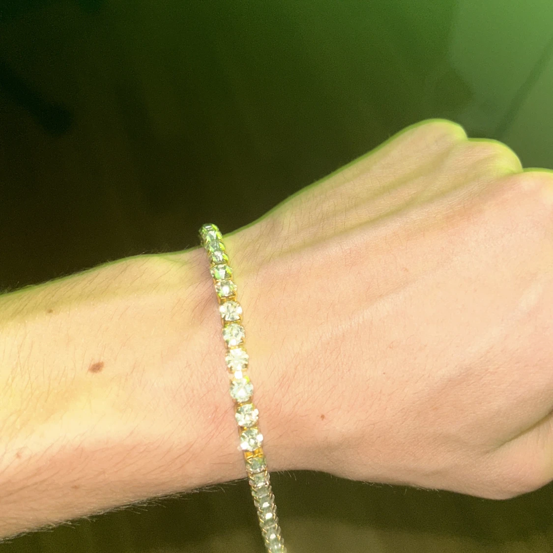 Guldarmband men vita stenar - 91