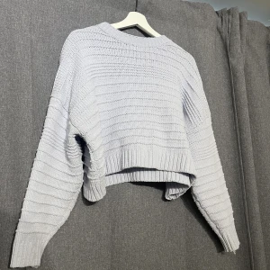 Ljusblå stickad  - Mysig ljusblå stickad topp 