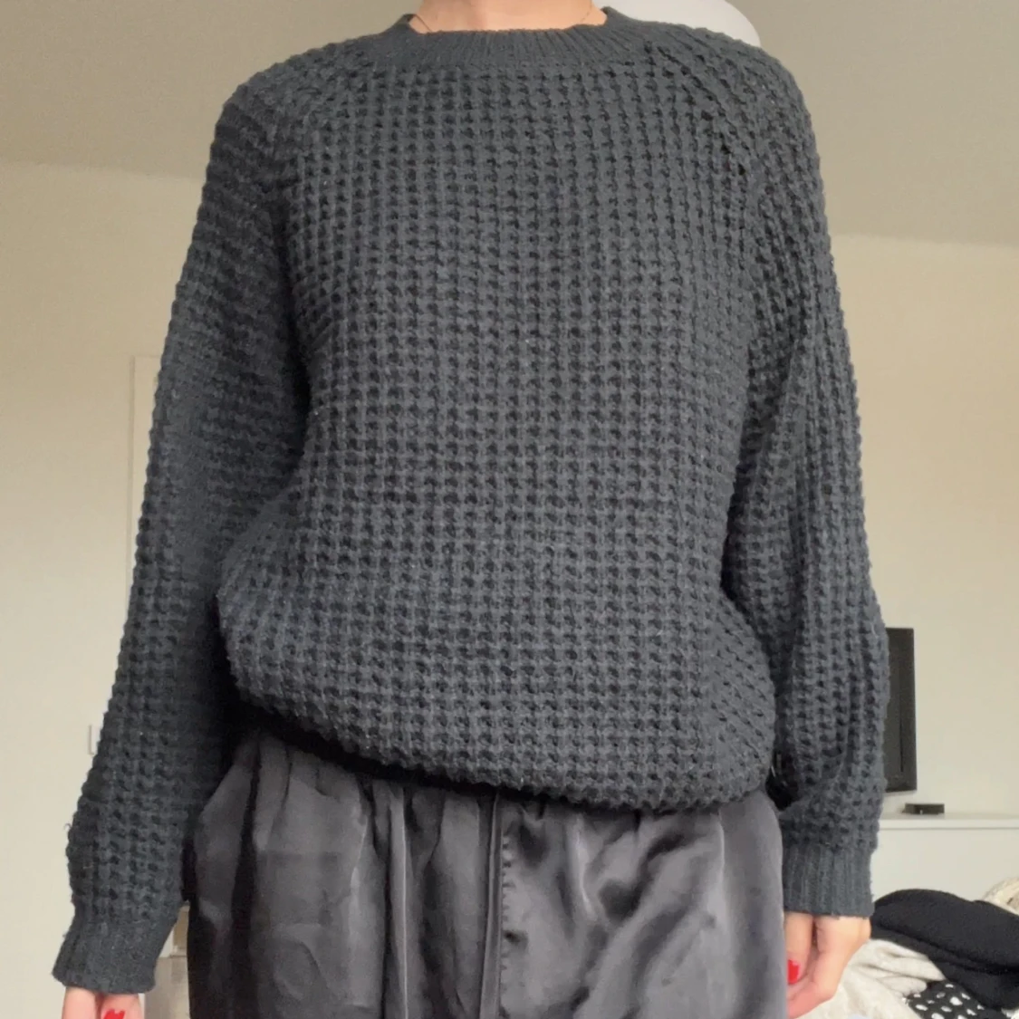 Svart stickad tröja