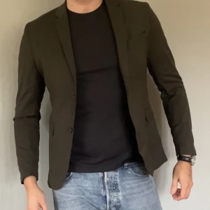 Kavaj från HM  - En olivgrön Kavaj från HM i storlek M