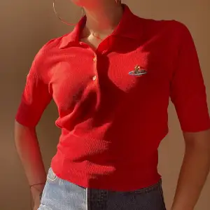 Vintage Designer Vivienne Westwood Red Label Polo.  Embroidered Signature Logo. Made In Italy.   Excellent Condition  Best Fits XS/S 45 CM/ 17.7 IN Length 27 CM/ 10.6 IN Sleeve 76 CM/ 29.9 IN Chest 64 CM/ 25.2 IN Waist