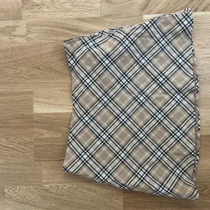 rutig mini kjol - aldrig använd