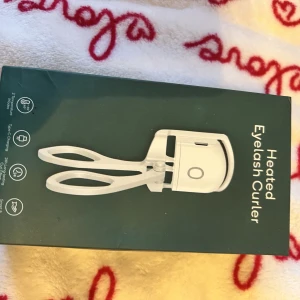 Elektrisk/värme ögonfrans böjar - Elektrisk/värme ögonfrans böjare, i rosa färg.  Produkten är ny och oanvänd i sin orginal förpackning.  Usb sladd följer med i orginal förpackning. 