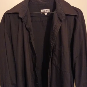 Taylor svart skjorta. XL - Snygg men för stor för mig. XL