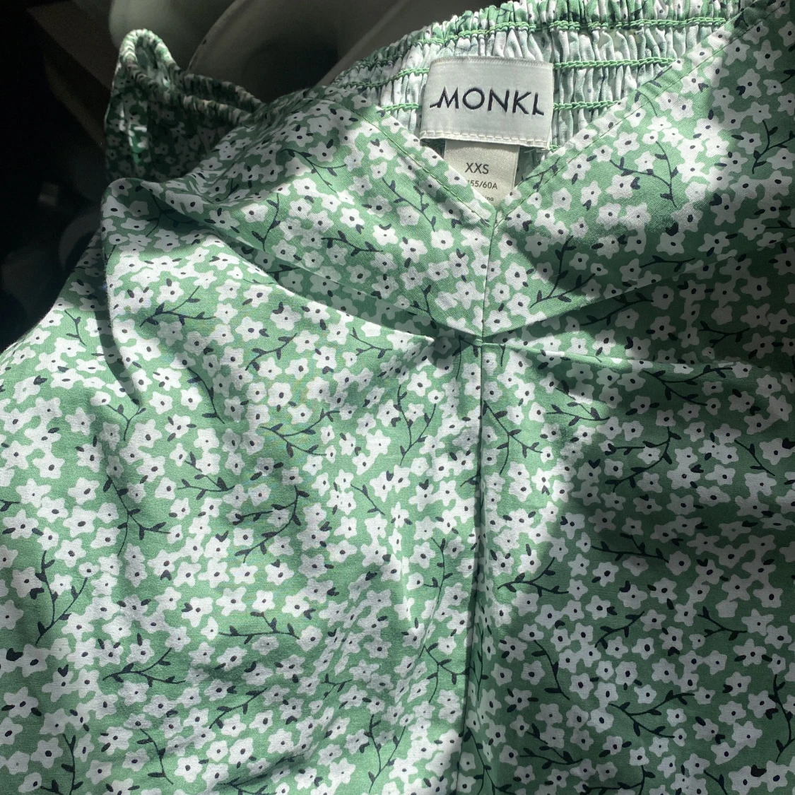 Blommig byxdress  - 90