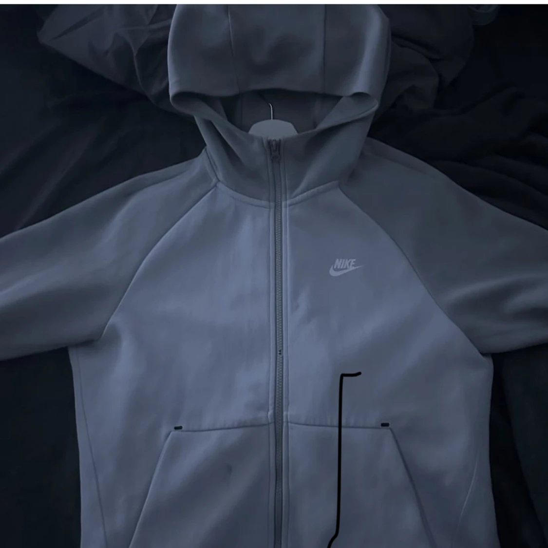 Nike tröja i ljus blå färg