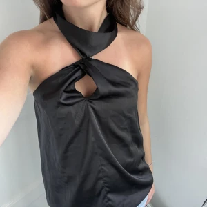 Topp! - Snygg topp i satin material!