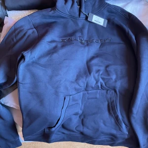 Sail Racing Bowman Hood - Finns flera st i storlek S,Xl,XXL