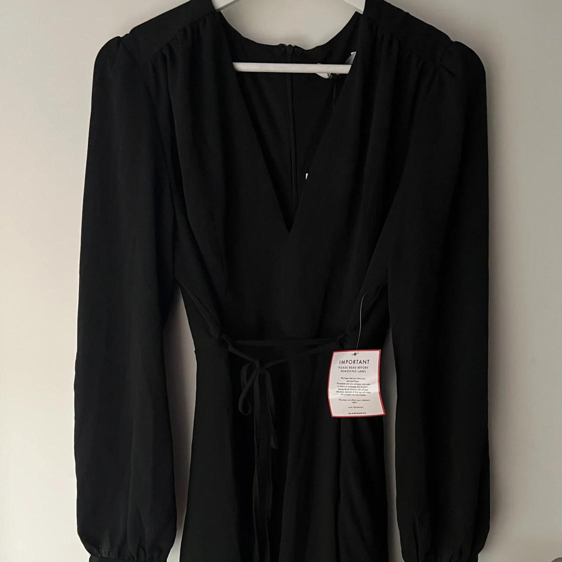 Svart kort långärmad klänning 