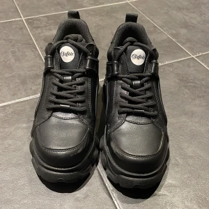 Black Buffalo Sneakers/Boots  - • Black Buffalo Sneakers/Boots • Barely used with a small scuff on the front of the left shoe as seen on the pictures • EUR 37, US 6 1/2, UK 4  • Peta-Approved Vegan Leather 