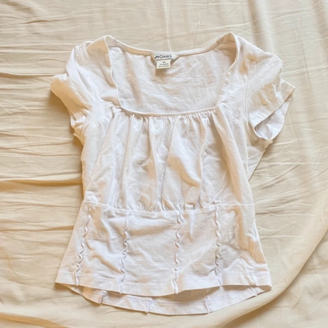 Vit korsettliknande topp