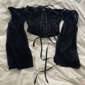 Korsett  - Svart topp, korsett. Från PLT, oanvänd med prislapp. 