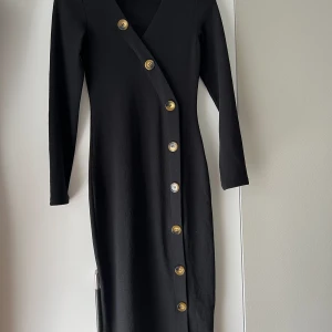 Klänning H&M - Använd endast en gång, så klänningen är i nyskick! 