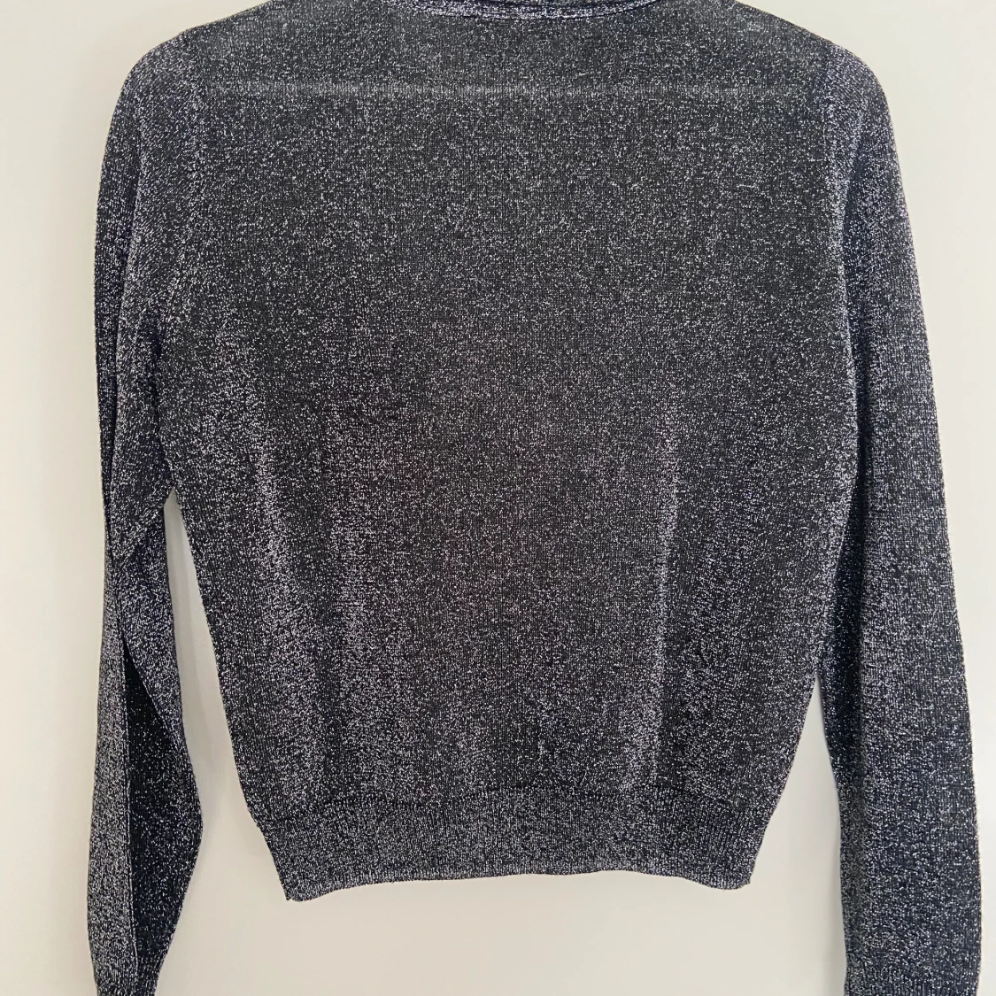 Glittrig topp/tröja - 91