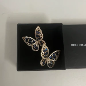 Hudi Collections fjärils örhängen  - Så fina! Använda endast en gång så dom är i nyskick 