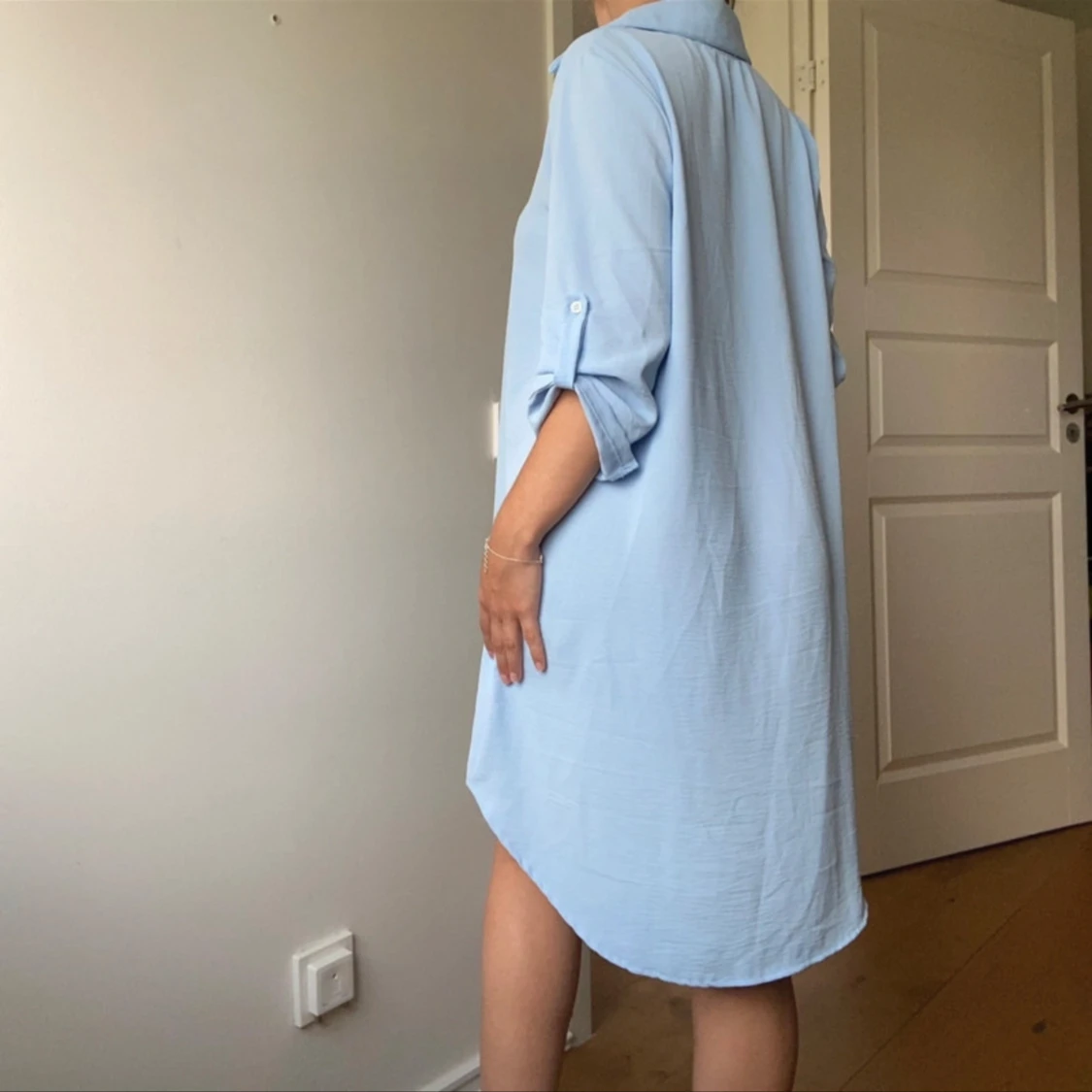 Ljusblå klänning - 91