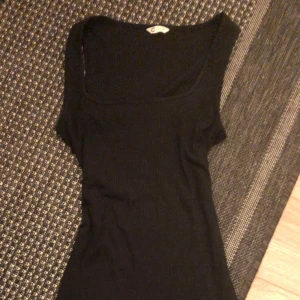 Klänning - Svart tajt lång klänning
