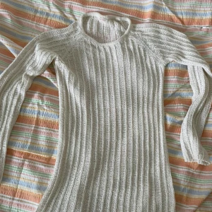 Stickad klänning - Ingen storlek men passar M-L