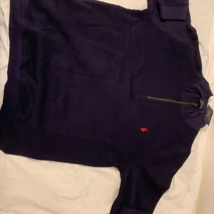 Polo ralph lauren zipper sweater - Color: Navy blue Size: L works if you are XL too (little bit big) Care label: Not recommended to machine wash if, (hand wash it). The material is really sensitive.  Comes with tags and the bag (Polo ralph lauren)