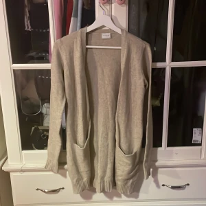 Kofta lång  - Xs  Kofta  Långa armar 