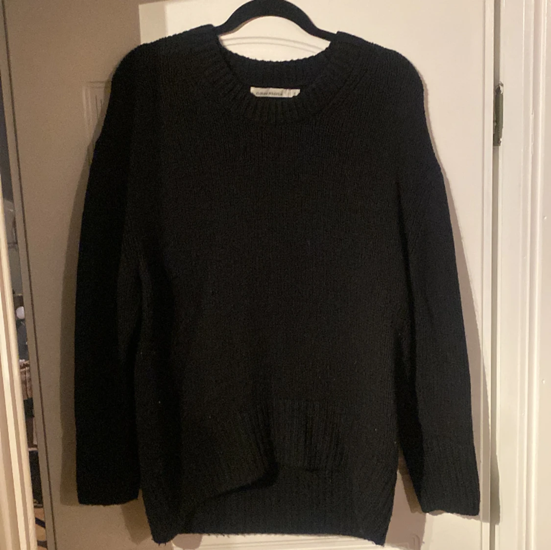 Svart stickad tröja