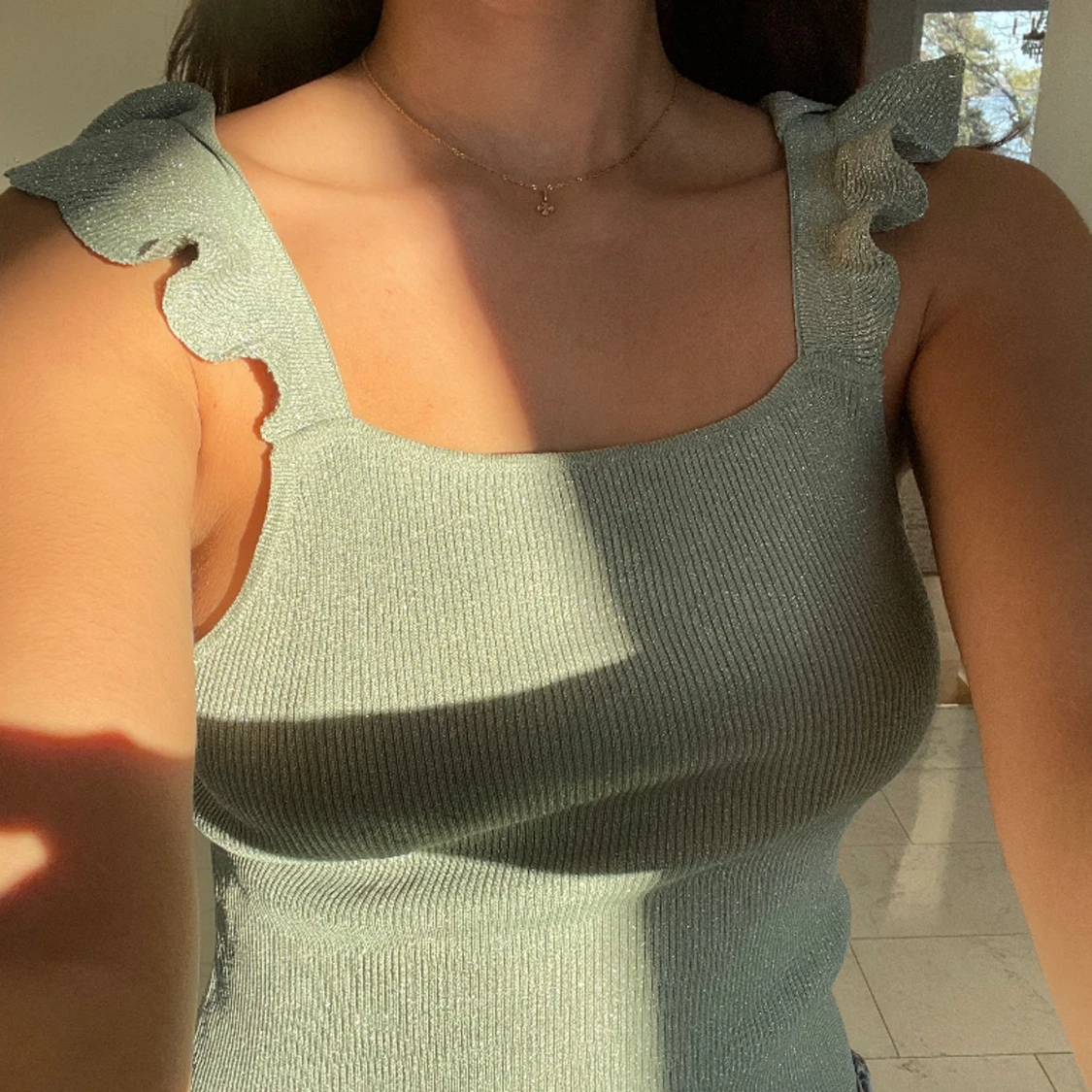 Glittrig stickat linne - 90