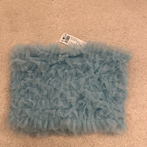 Topp - En jättefin blå fest topp! Aldrig använd  Nypris 299 kr 