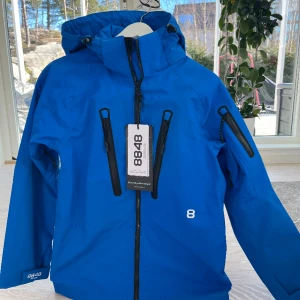 Skidjacka Altitude 8848  - Oanvänd skidjacka i storlek: 160. Märket är: Altitude 8848