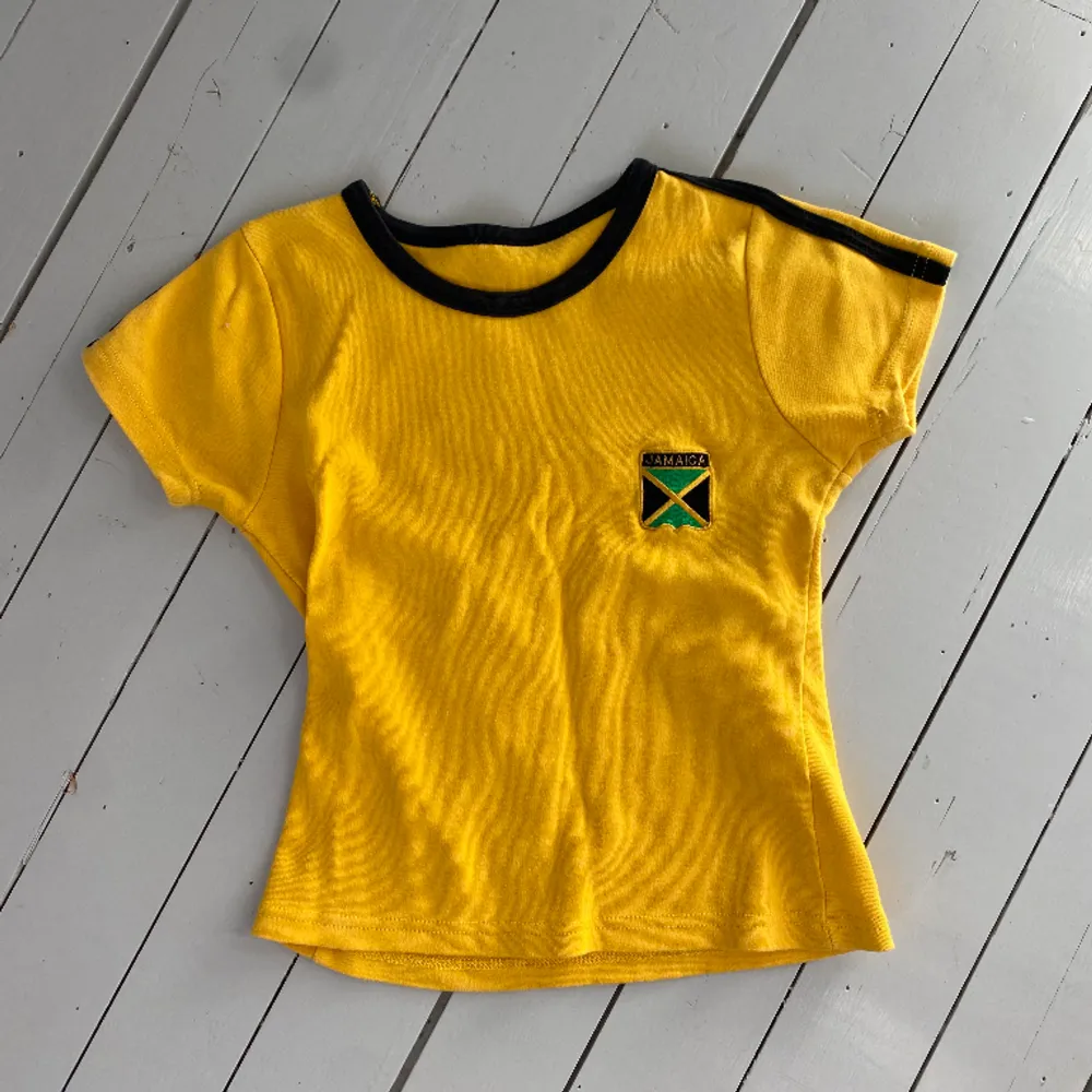 Jamaica baby-tee. Använd få gånger, nyskick.. T-shirts.