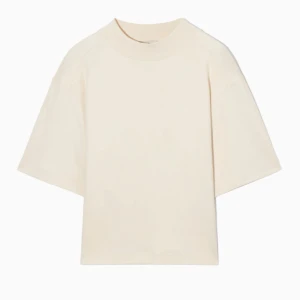 Cos Tshirt  - Cremevit färg, bara testad. Insvängd midja 