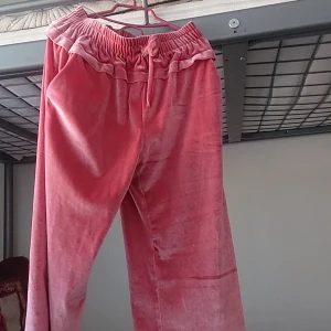 Trousers - It is a comfy and cozy pink color trouser. It is for 9 to 10 year old girls. Prices can be lower if interested