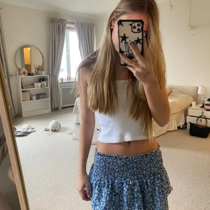 Blue skirt  - Only worn twice, cute flowery skirt with shorts inside. (Price can be discussed)