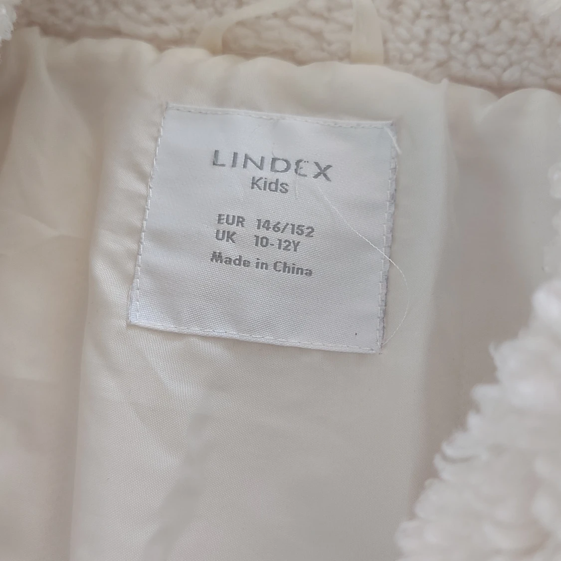 Vit jacka 146/152 - 91