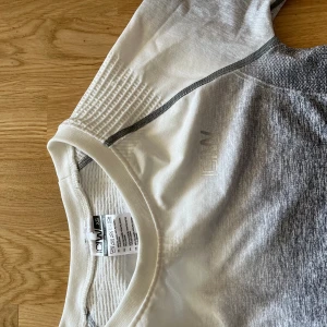 ICIW tränings topp - Använd 2 gånger men för liten för mig.  Storlek XS