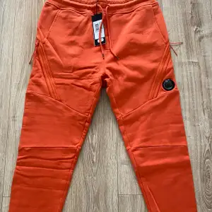 CP Company Sweatpants (Orange). Size M. Retail 2300kr.