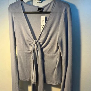 Topp - Fin knyt topp med prislapp! Aldrig använd så i nyskick. Storlek M, passar även en S!