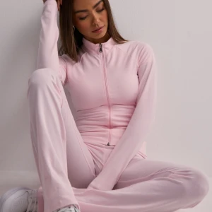 Tränings tröja Nelly storlek xs  - Rosa zip  Helt ny , storlek xs  