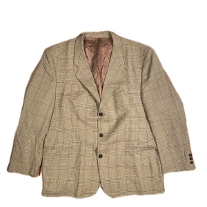 Vintage kavaj - Sitter som en XL, passar perfekt oversize på en S eller M. Mycket fint skick, inga brister! Axelvaddarna har tagits bort