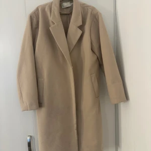 Kappa - Säljer denna fina kappan från NELLY. Stl:40