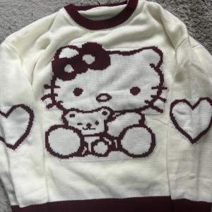 Hello Kitty tröja. Köpt här på Plick men använder tyvärr inte. Jättesöt!