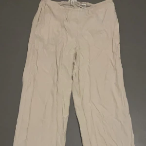 Linnebyxor  - beige linnebyxor, storlek M