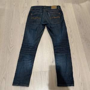 Nudie jeans 31/30 Snygg fade speciellt där bak