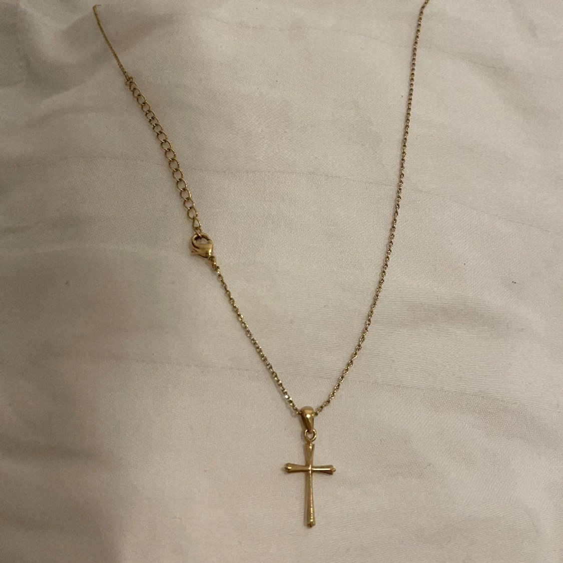 Korshalsband doppat i guld  - 91