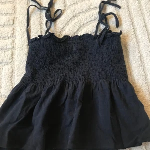 Volang tröja - Ett linne som är som en kjol Säljer pga den it passar mig