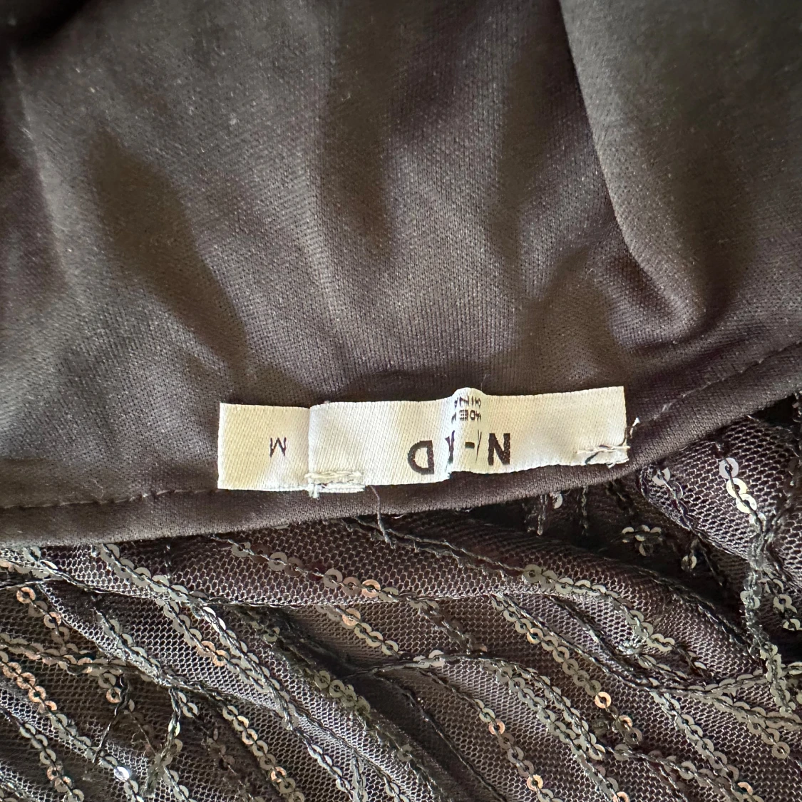 Glittrig klänning - 91