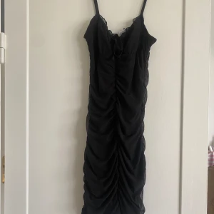 Klänning  - Fin passform 